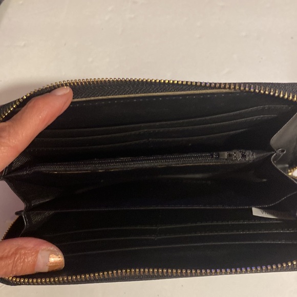 NWOT. Black wristlet with metal round embellishments. - Picture 3 of 4
